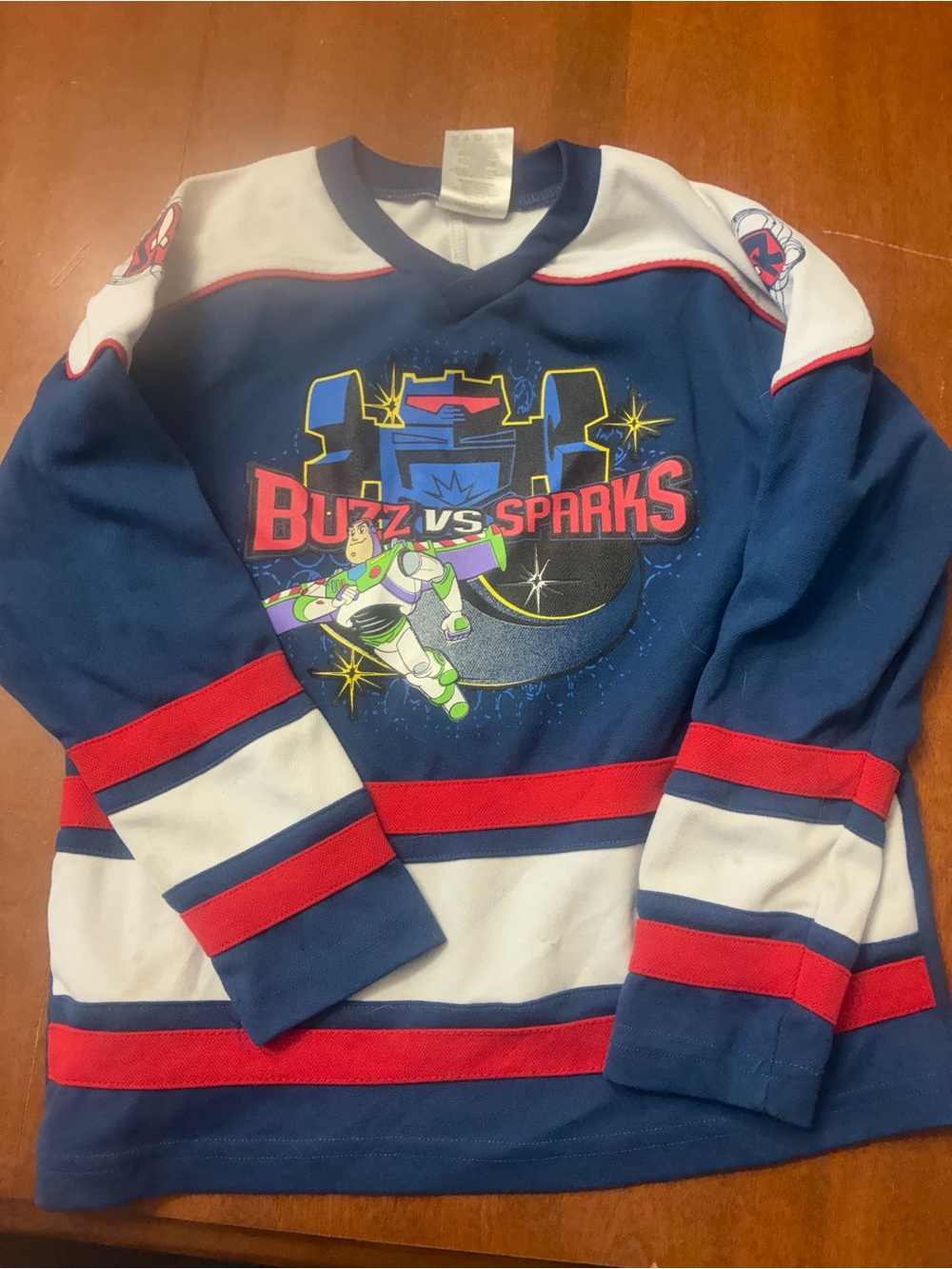 Buzz vs Sparks Navy Blue Long Sleeve Kids Hockey Tee